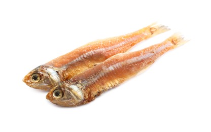 Delicious dried salted anchovies on white background