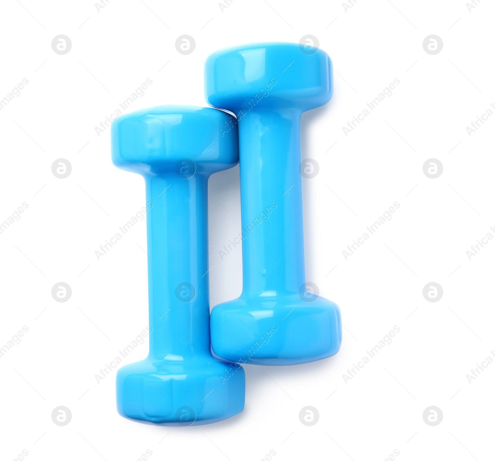 Photo of Color dumbbells on white background. Home fitness