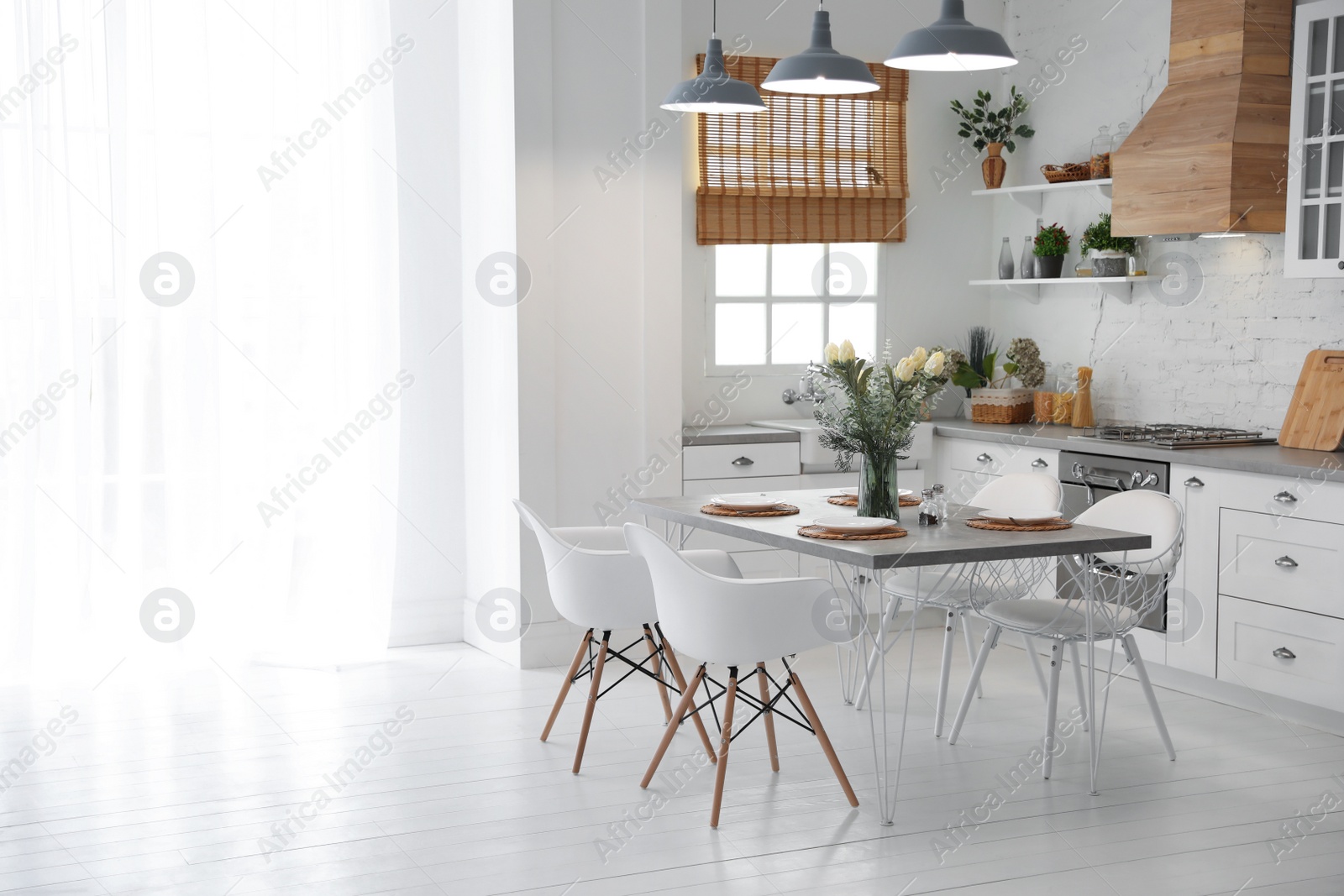 Photo of Beautiful kitchen interior with new stylish furniture