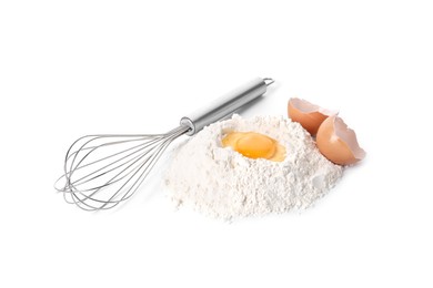Photo of Whisk and pile of flour with egg yolk isolated on white