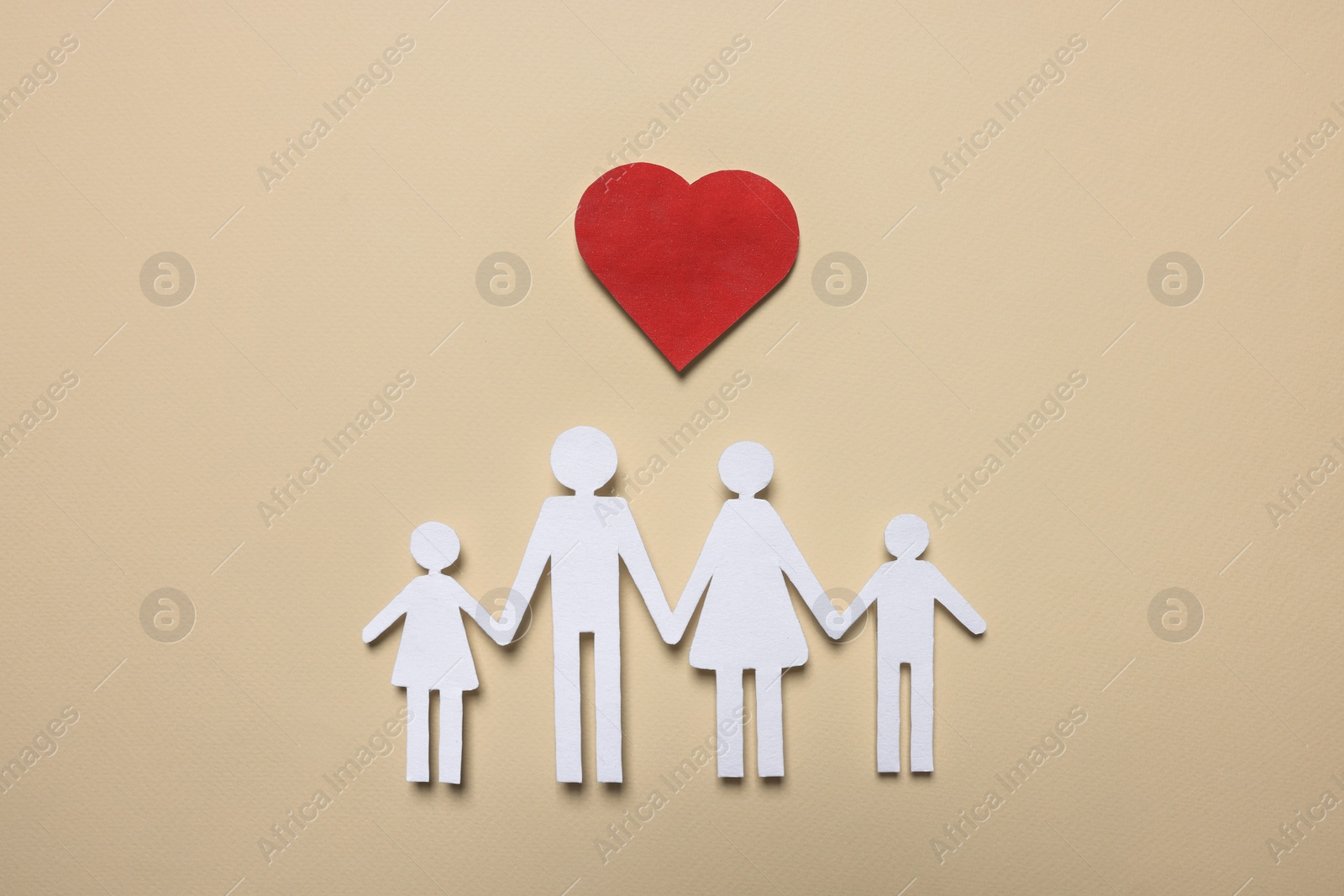 Photo of Paper family figures and red heart on beige background, flat lay. Insurance concept