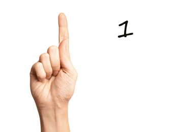 Image of Woman showing number one on white background, closeup. Sign language