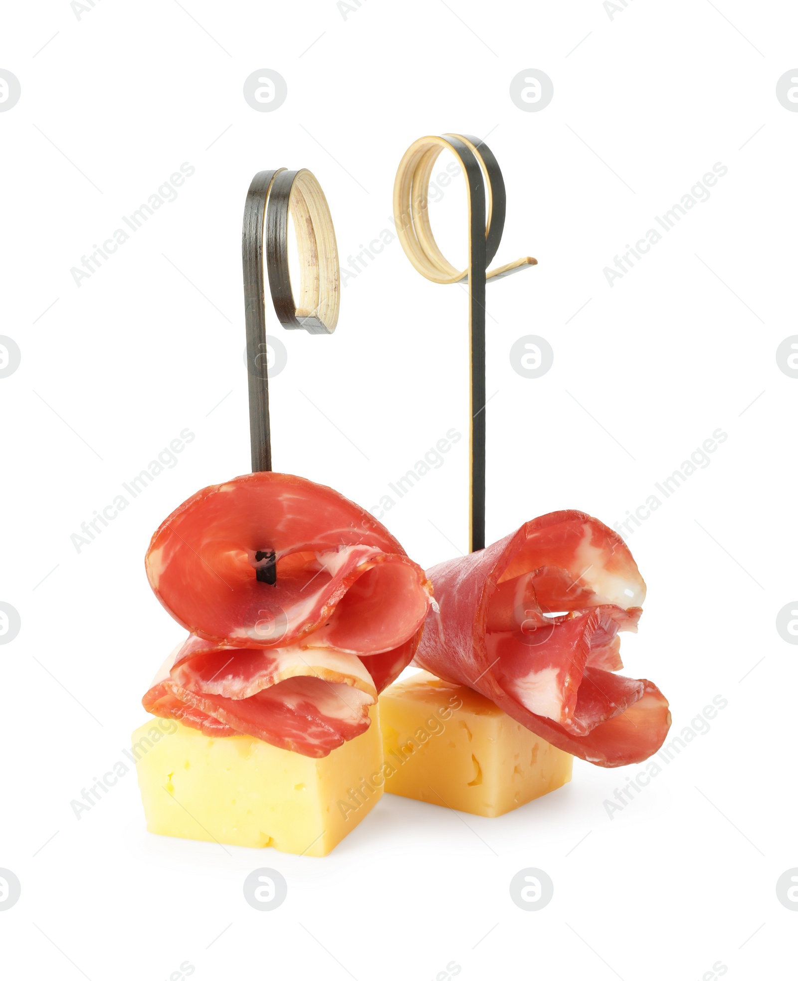 Photo of Tasty canape with cheese and ham isolated on white