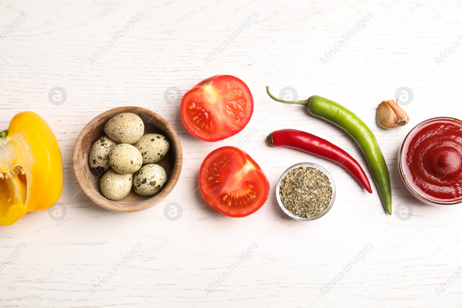 Photo of Flat lay composition with ingredients for cooking on white wooden table