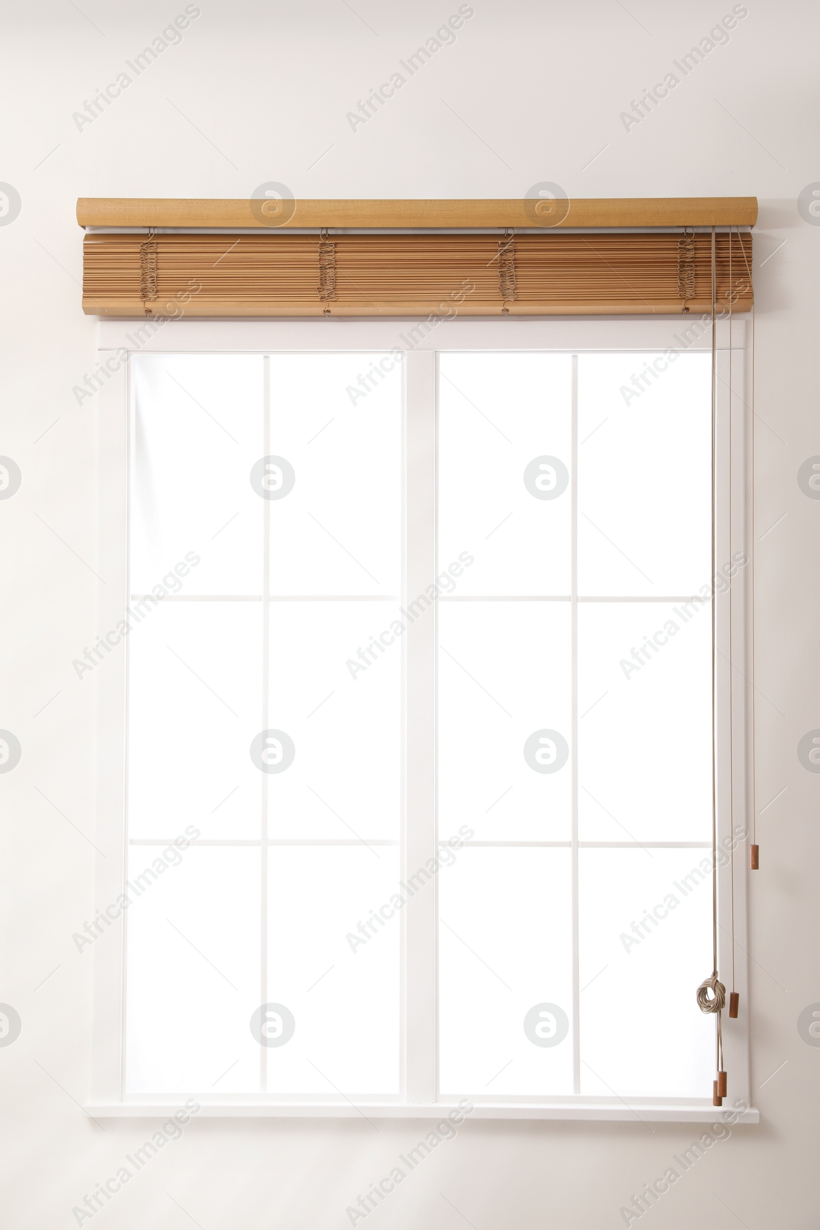 Photo of Modern window with open wooden blinds indoors
