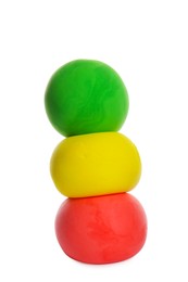 Photo of Stack of color play dough balls isolated on white