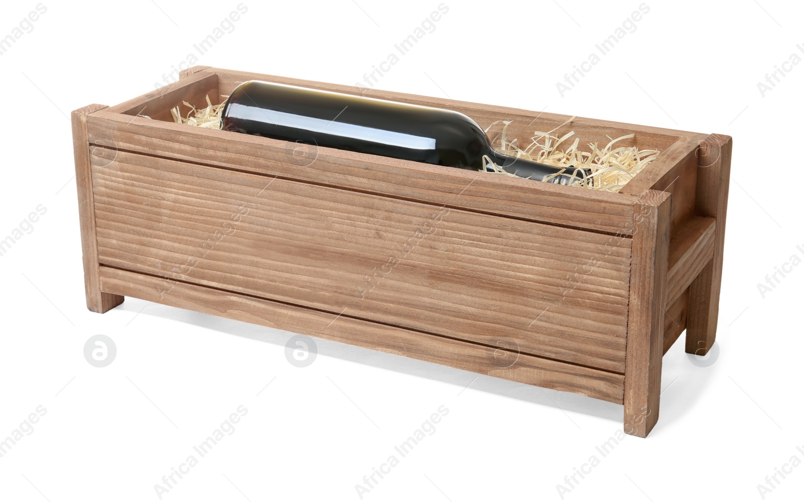 Photo of Open wooden crate with bottle of wine isolated on white