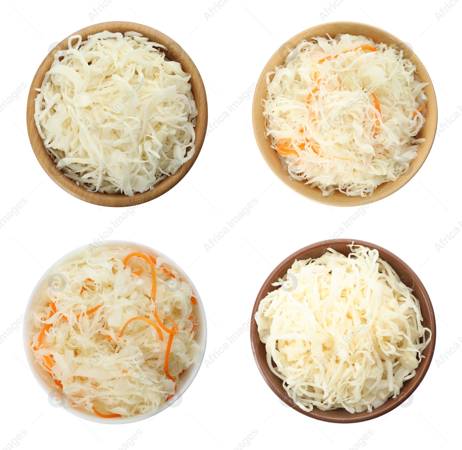 Image of Set of tasty fermented cabbage isolated on white, top view