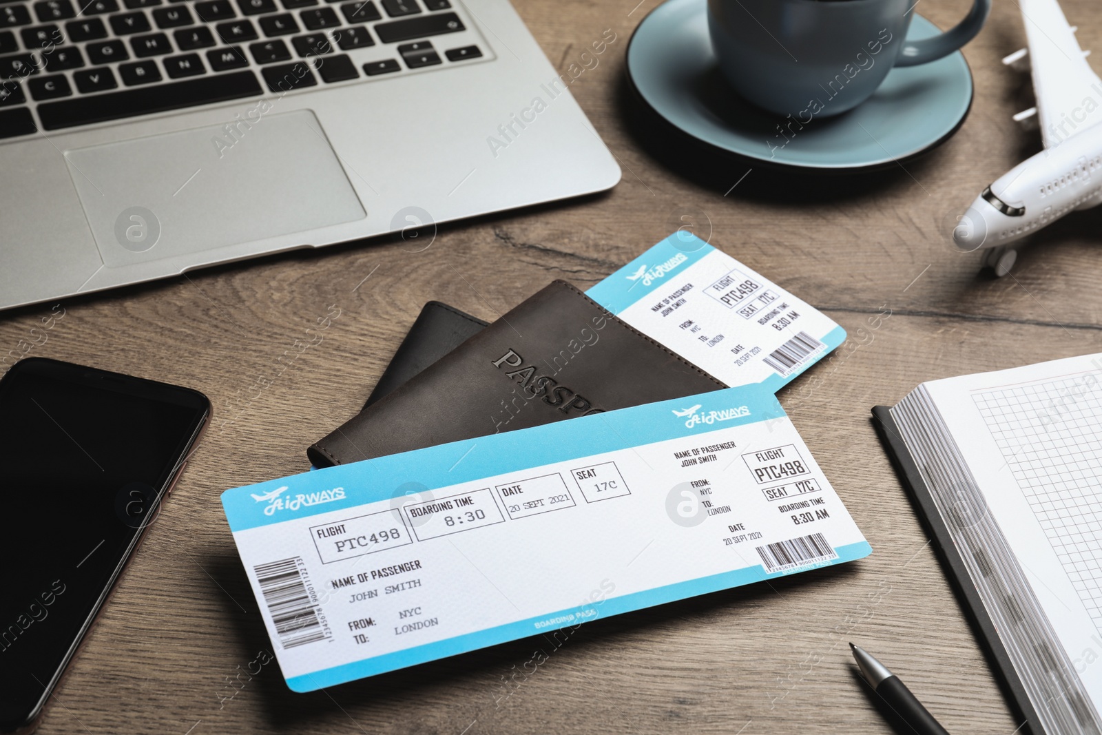 Photo of Composition with passports and tickets on wooden table. Travel agency concept