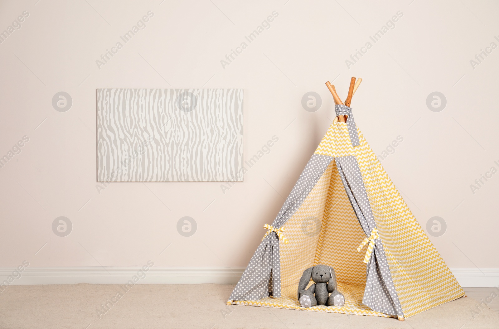 Photo of Cozy child room interior with play tent