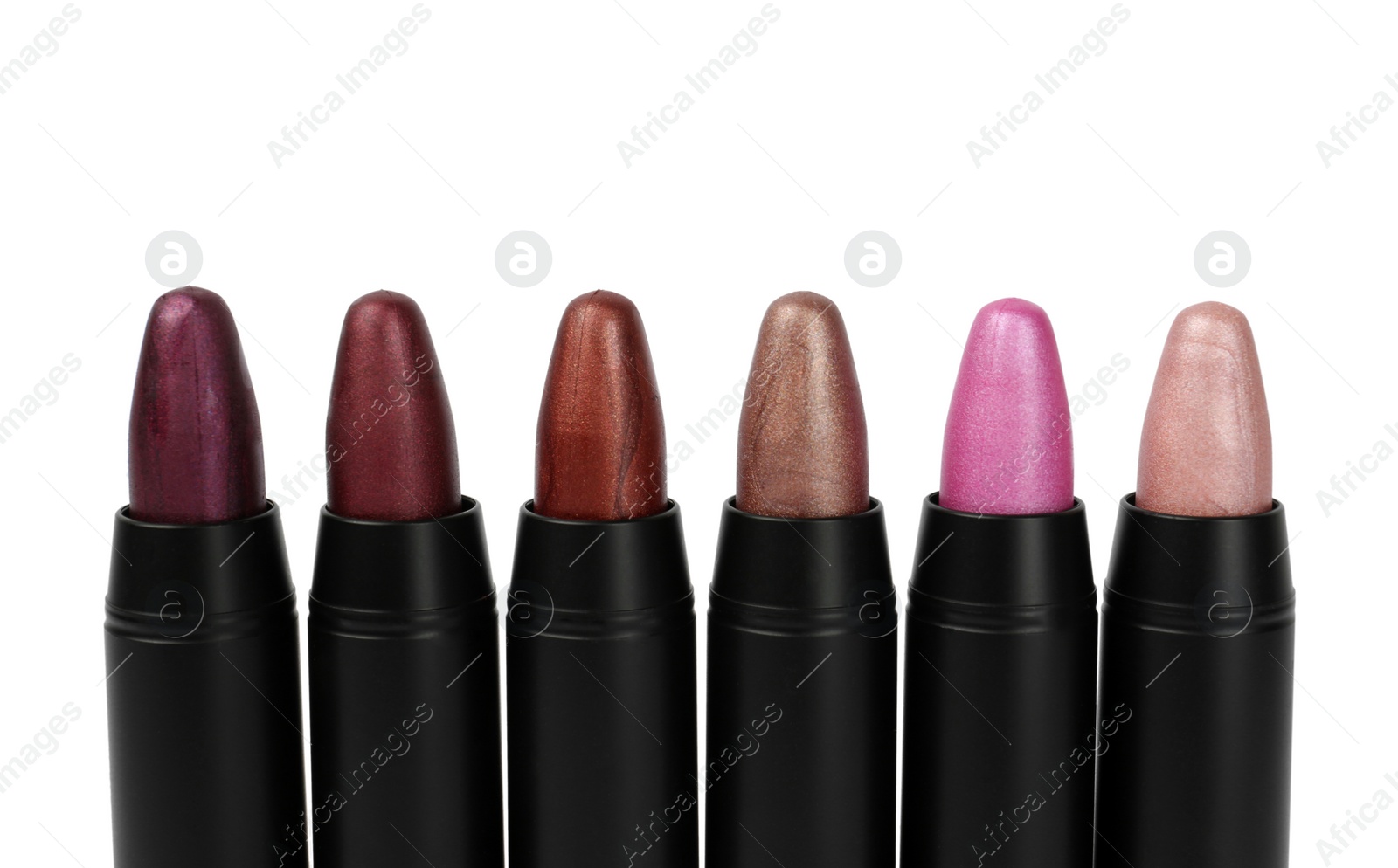 Photo of Set of colorful lipsticks isolated on white