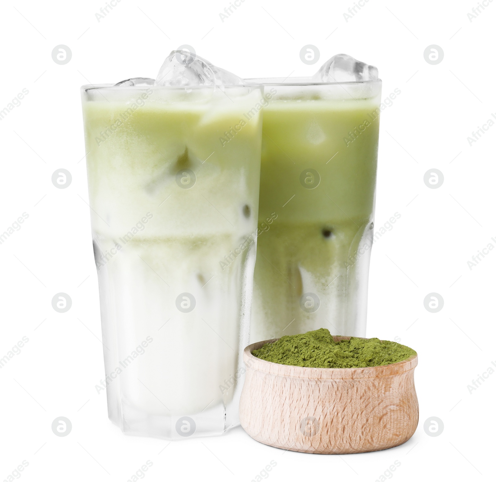 Photo of Glasses of tasty iced matcha latte and powder isolated on white