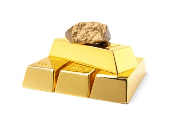 Gold nugget and ingots on white background