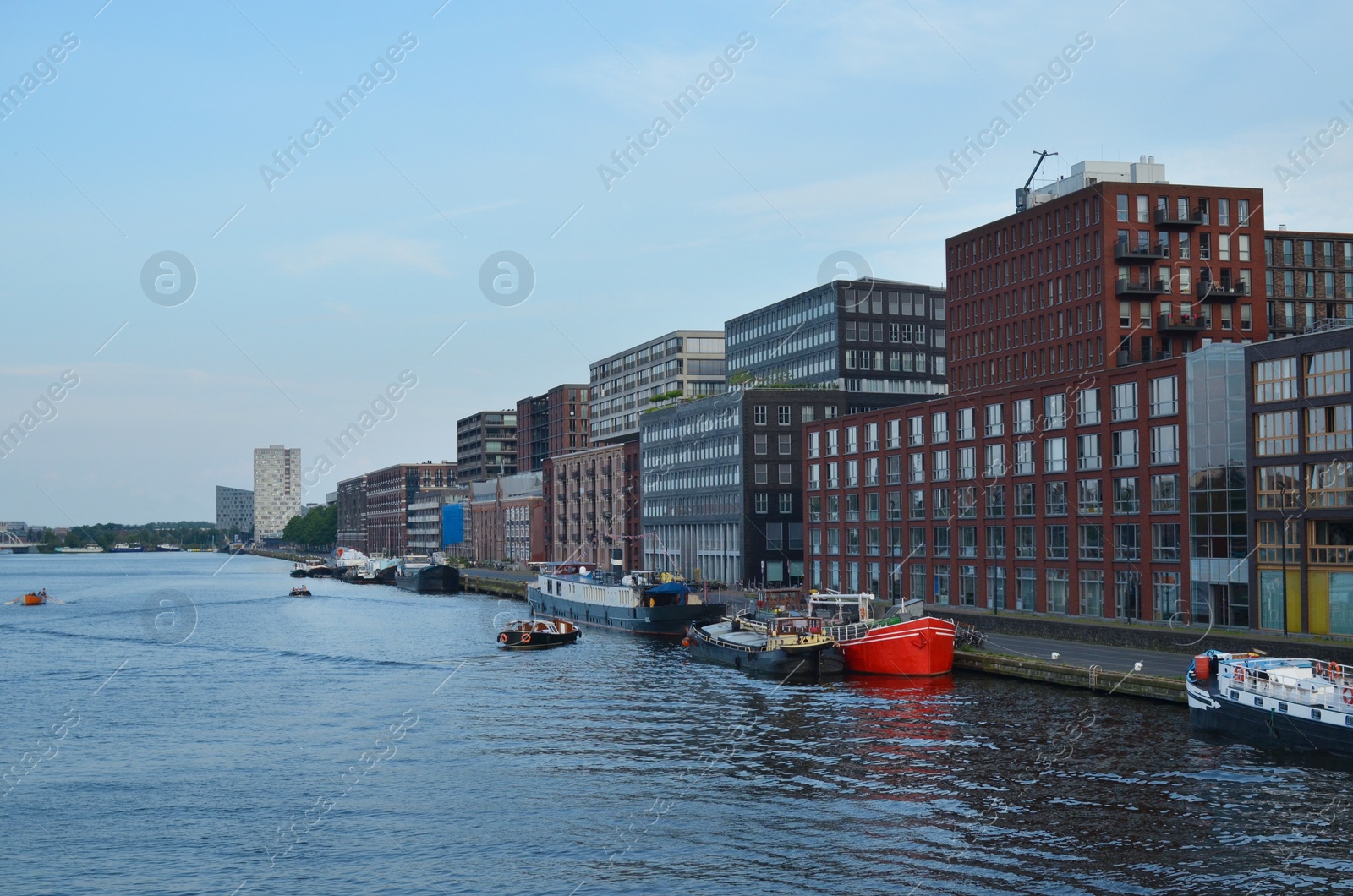 Photo of Beautiful view of cityscape with boats on river