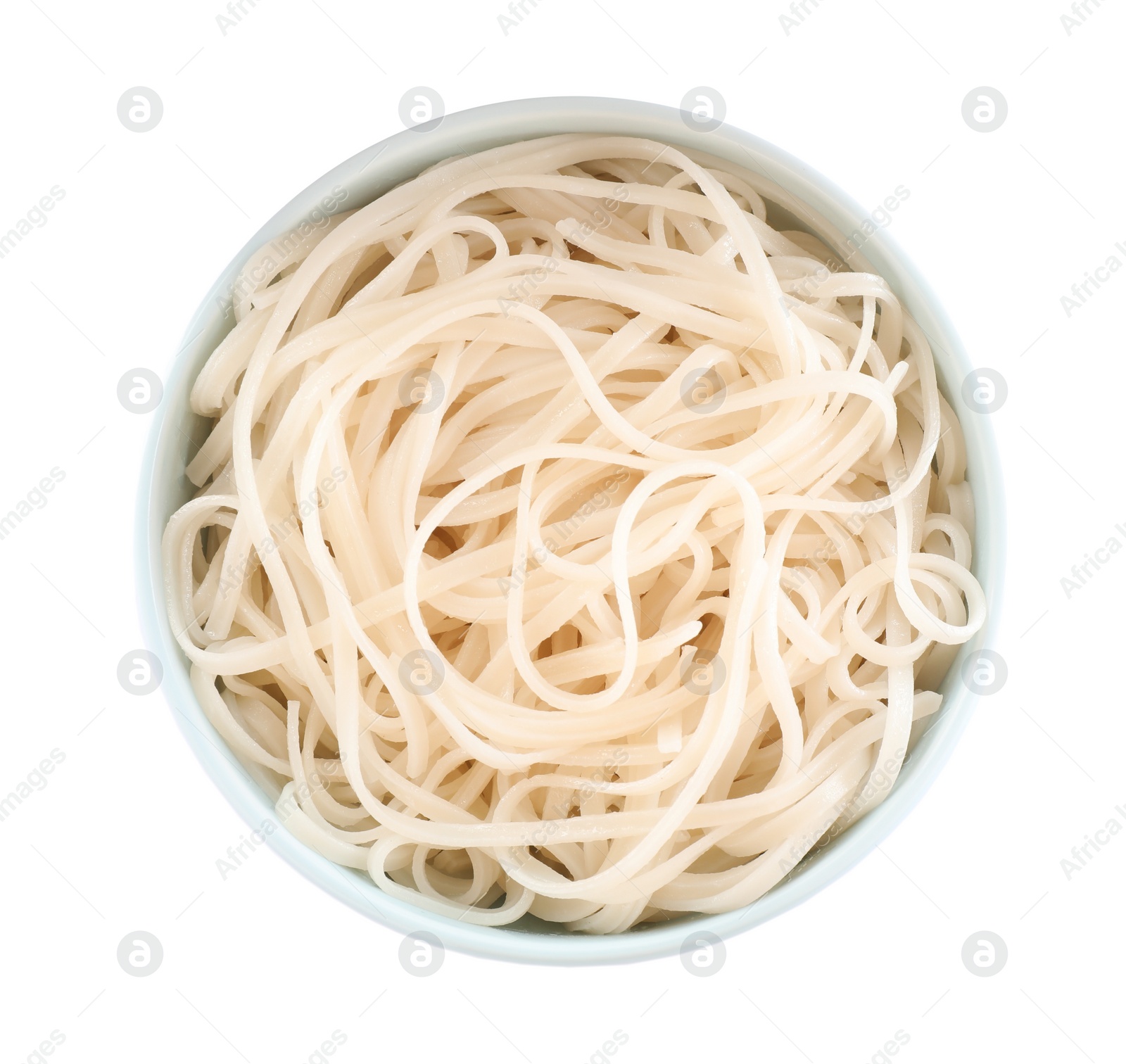 Photo of Bowl of tasty cooked rice noodles isolated on white, top view