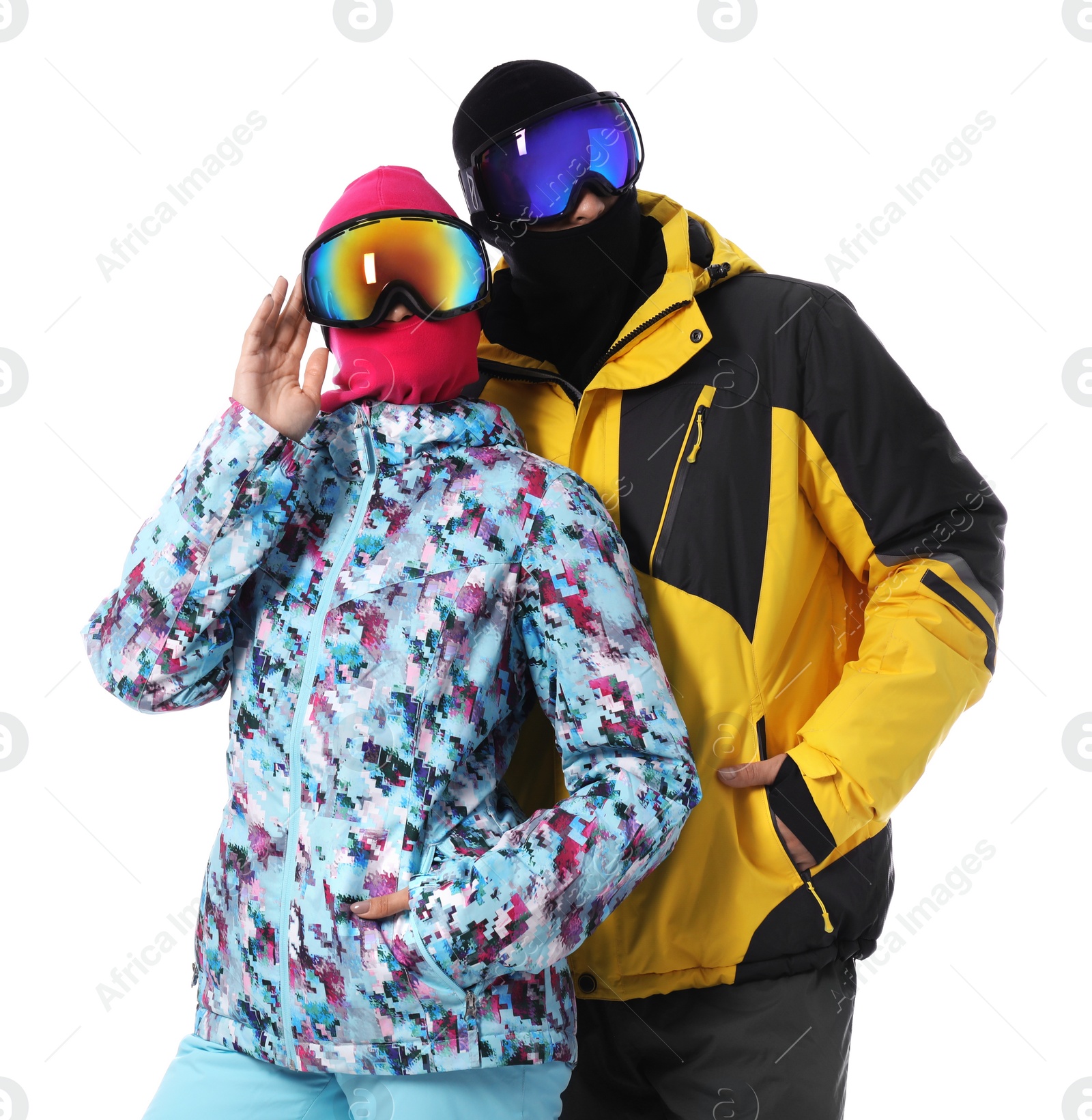 Photo of Couple wearing stylish winter sport clothes on white background