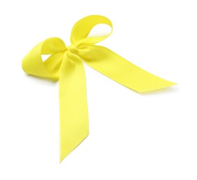 Photo of One yellow ribbon bow on white background