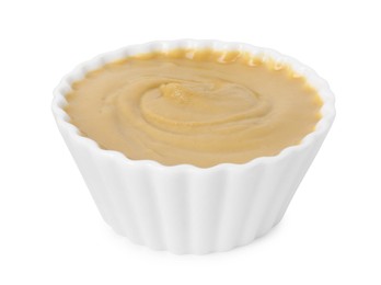Photo of Fresh tasty mustard sauce in bowl isolated on white