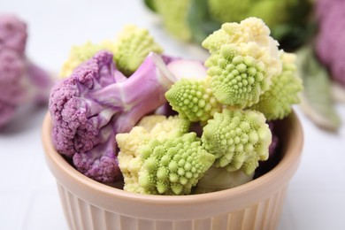 Bowl with various cauliflower cabbages, closeup view
