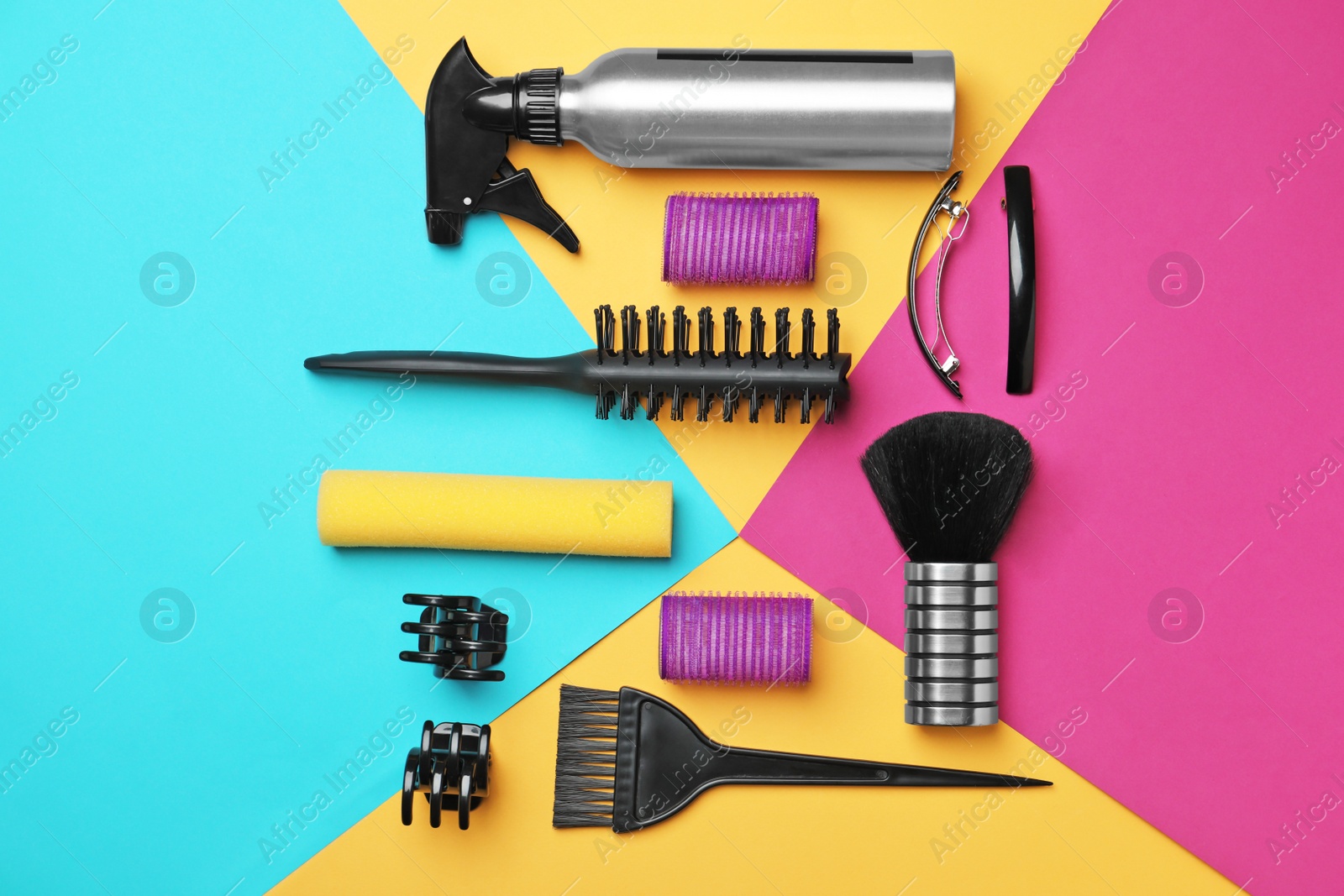 Photo of Professional hairdresser set on color background