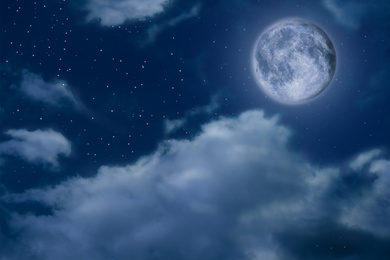 Image of Beautiful night sky with full moon and clouds