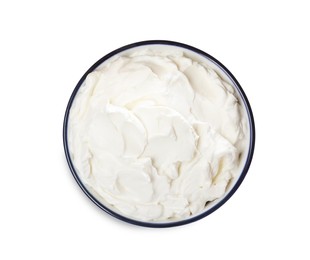 Photo of Bowl of tasty cream cheese isolated on white, top view