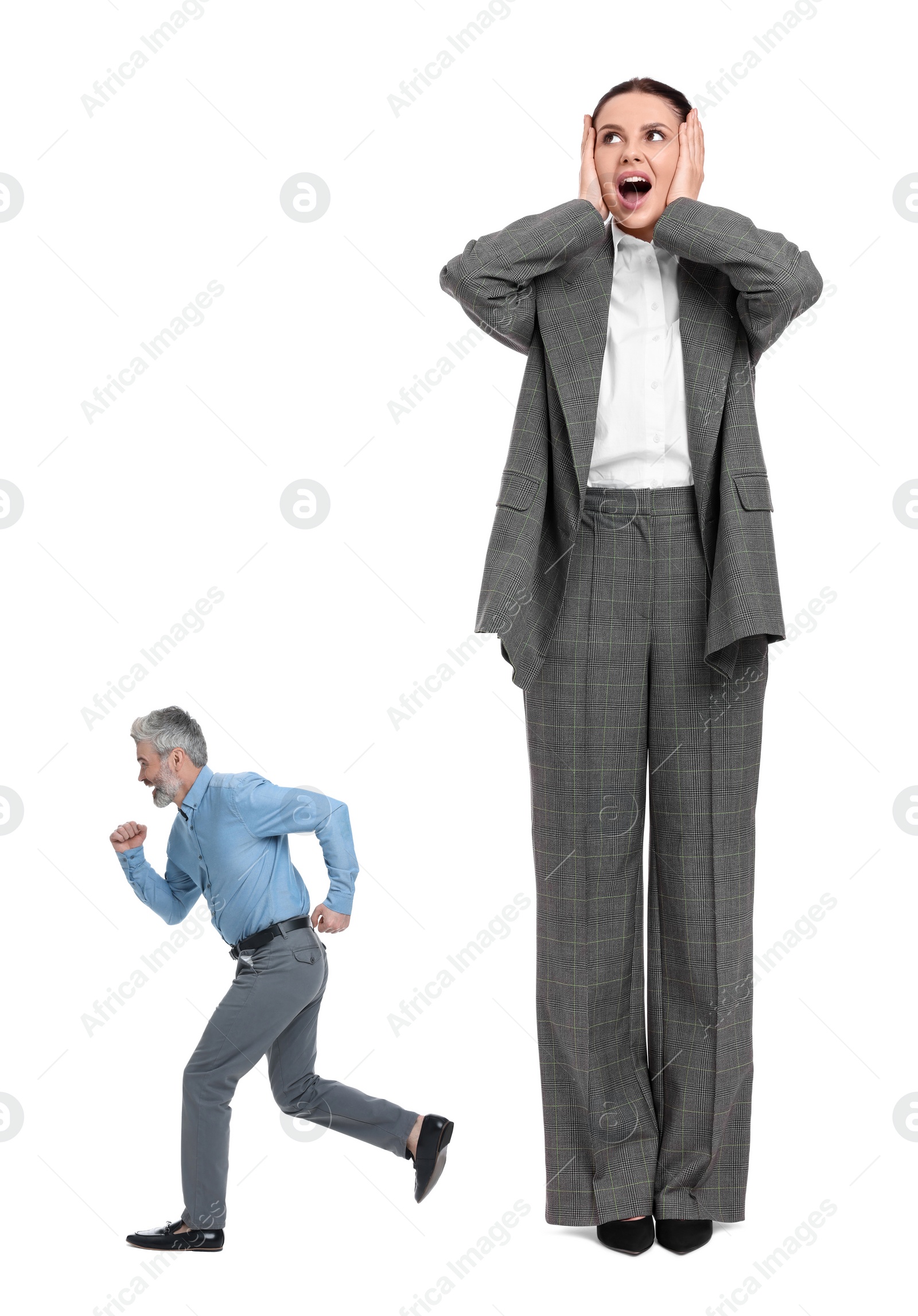 Image of Small man running from shocked giant woman on white background
