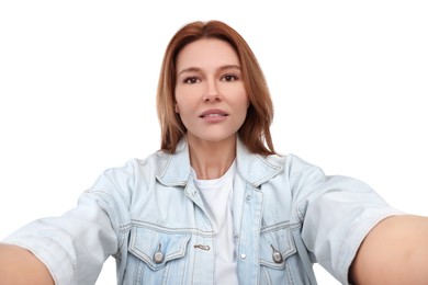 Photo of Beautiful woman taking selfie on white background