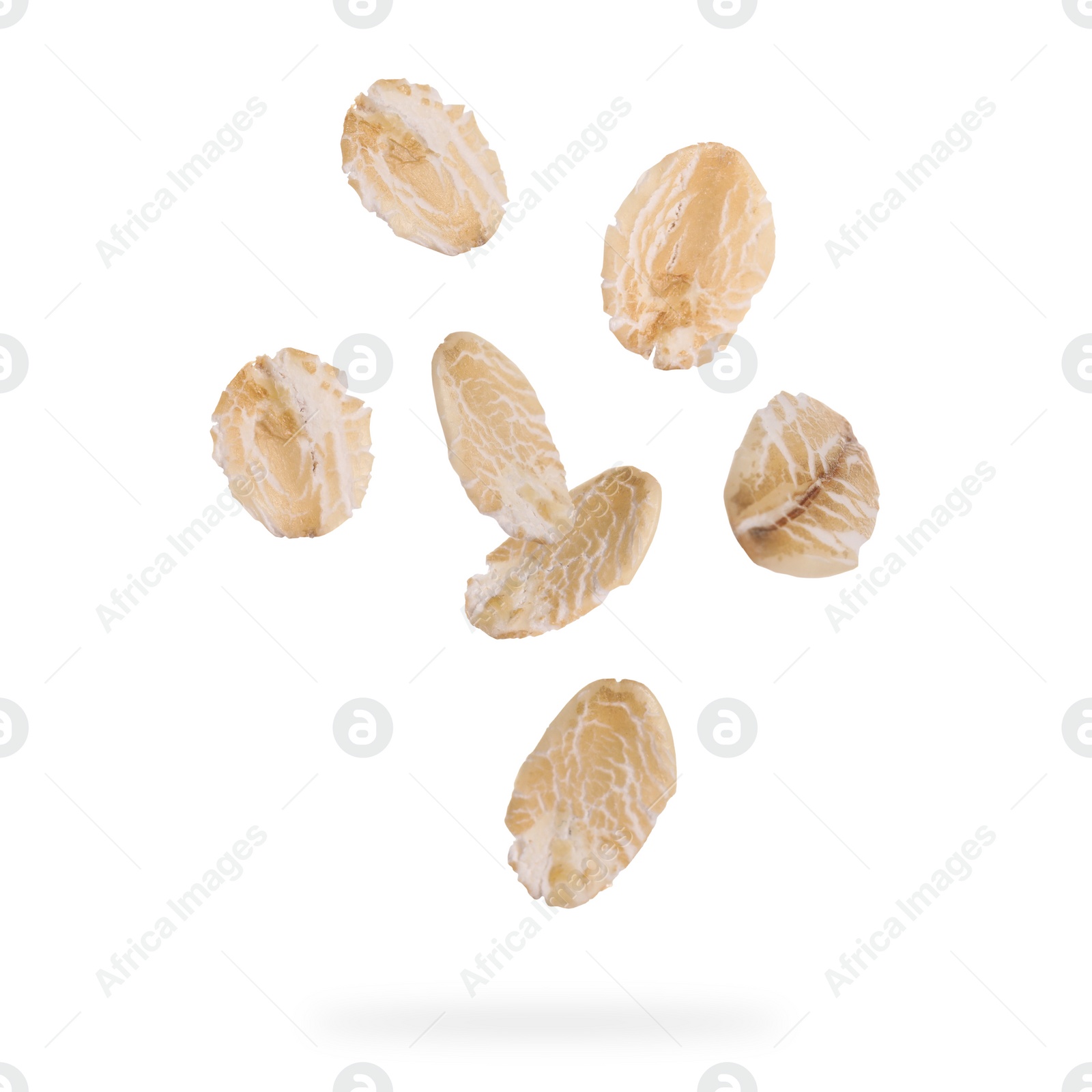 Image of Rolled oat flakes falling on white background