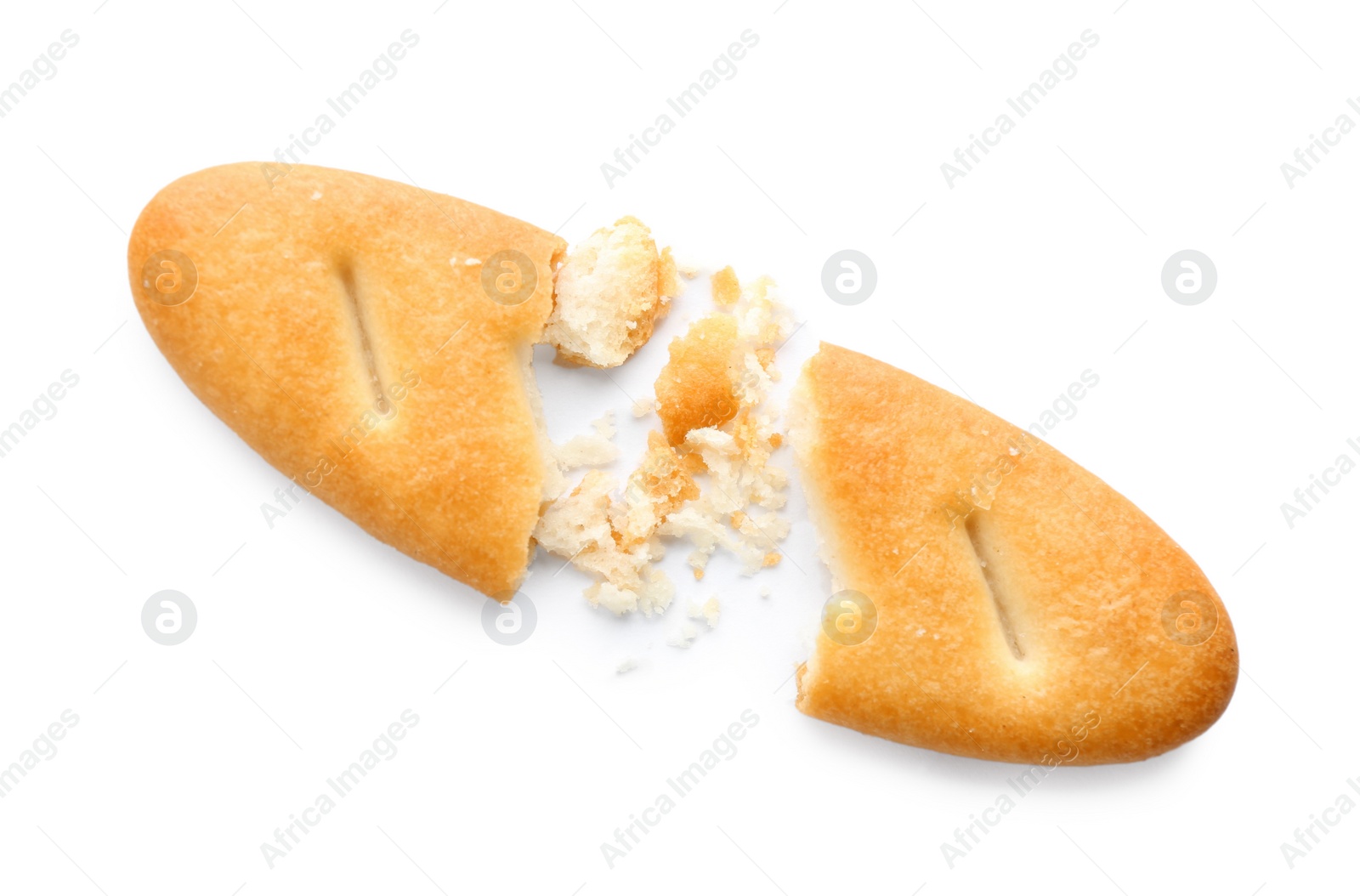 Photo of Broken delicious crispy cracker isolated on white, top view