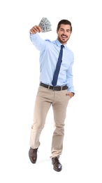 Photo of Handsome businessman with dollars on white background