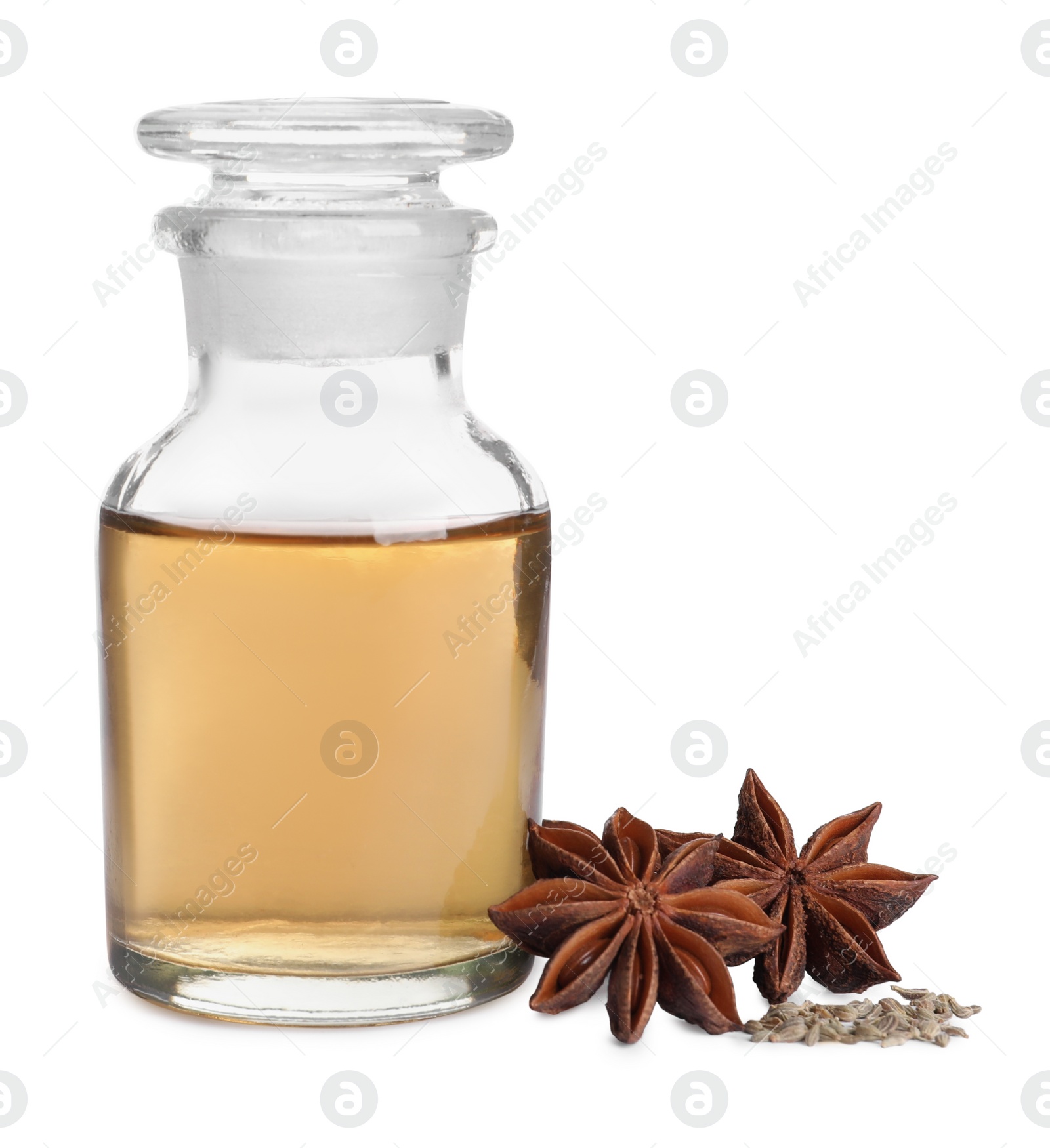 Photo of Anise essential oil and spice on white background