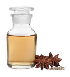 Photo of Anise essential oil and spice on white background