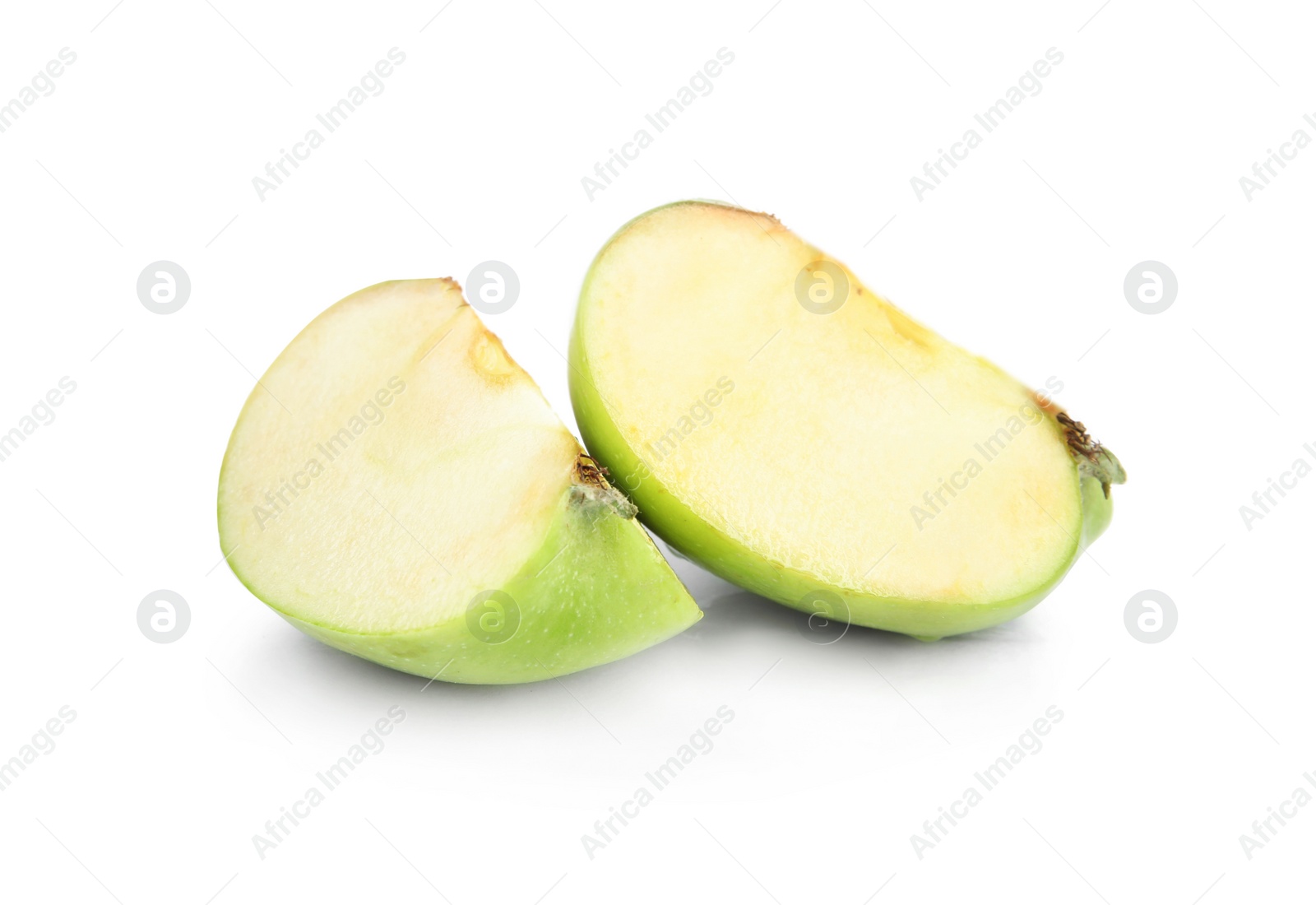 Photo of Pieces of fresh green apple on white background