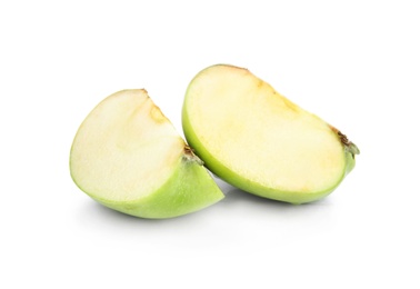 Photo of Pieces of fresh green apple on white background