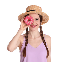 Beautiful young woman wearing stylish hat with donut on white background