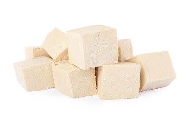 Photo of Cubes of delicious raw tofu on white background