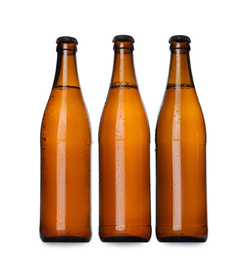 Photo of Brown bottles with beer isolated on white