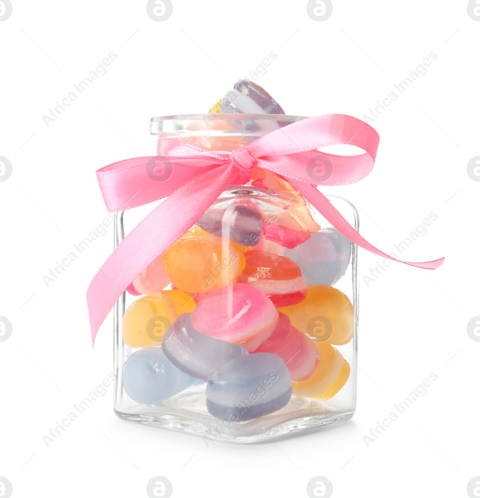 Photo of Colorful hard candies in glass jar isolated on white