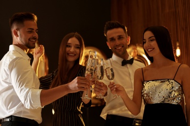 Photo of Young people celebrating New Year in club