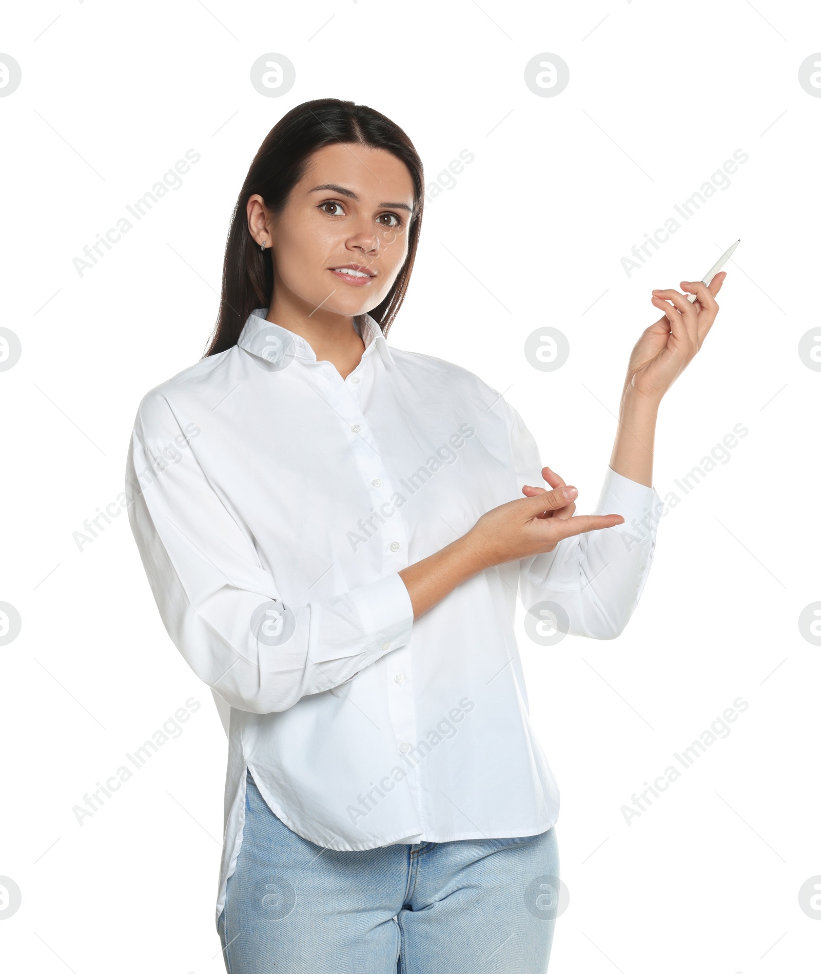 Photo of Beautiful young woman pointing at something with pen on white background. Weather forecast reporter