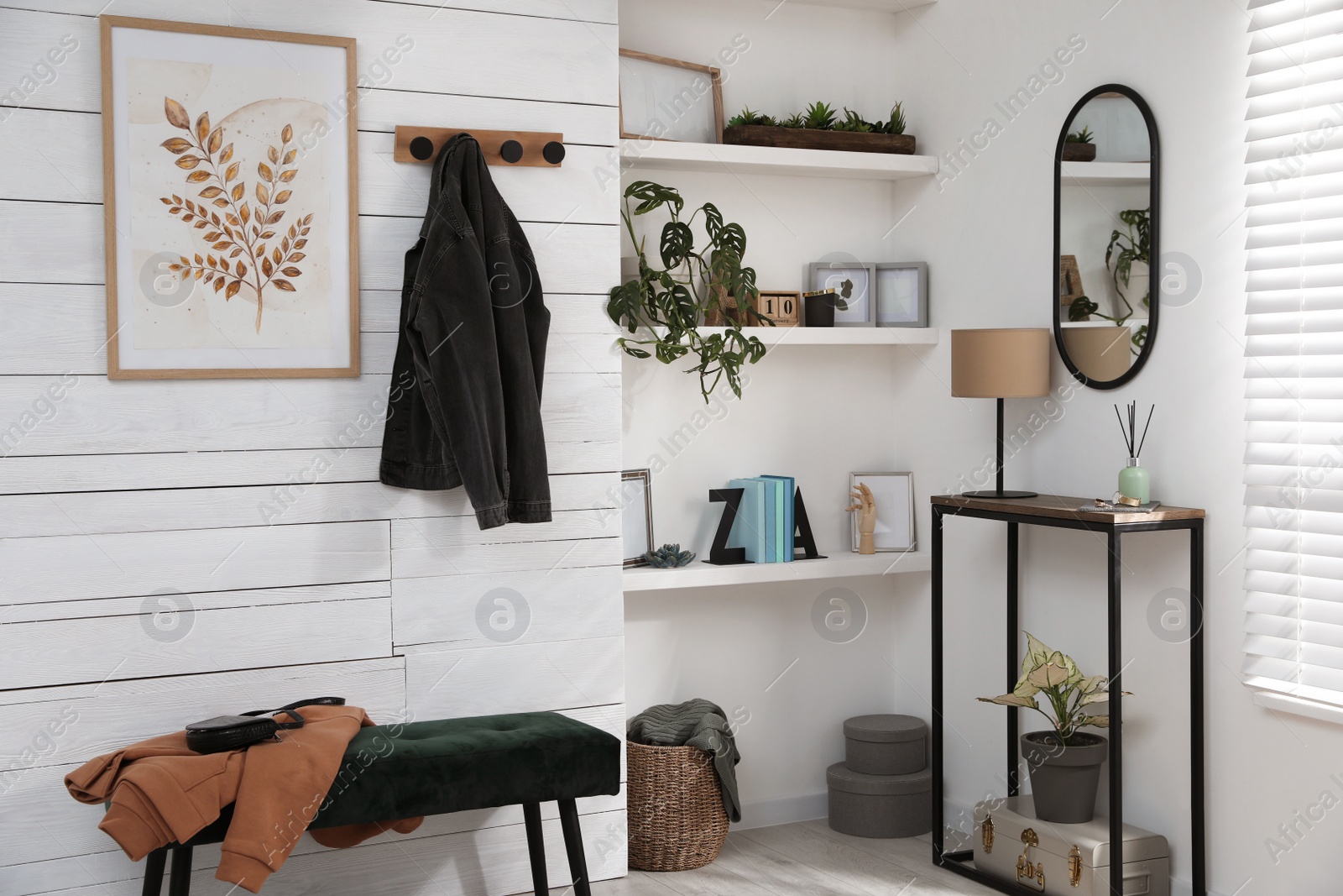 Photo of Hallway interior with console table and stylish decor