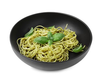 Photo of Bowl of delicious pasta with pesto sauce and basil isolated on white