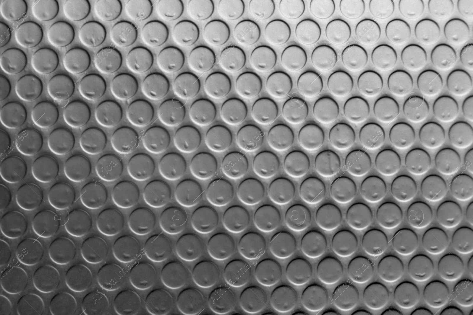 Photo of Texture of bubble wrap as background, top view