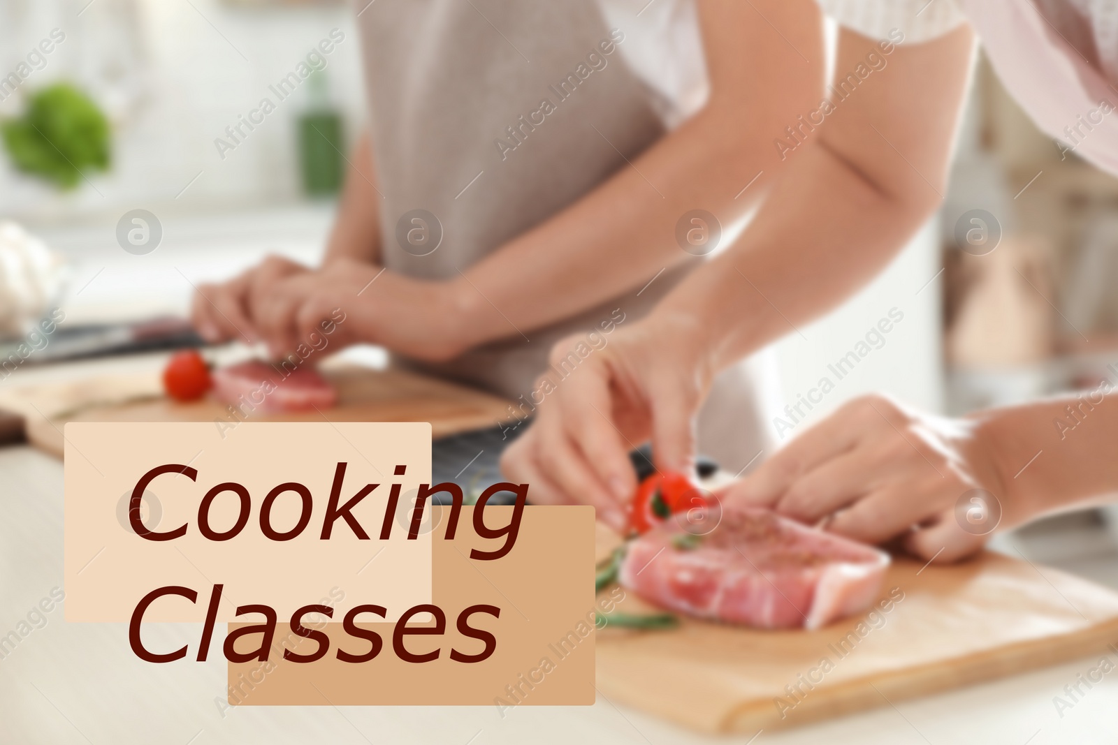 Image of Cooking classes. Blurred view of woman preparing meat on wooden board at table, closeup