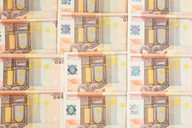 Photo of Euro banknotes as background, top view. Money and finance