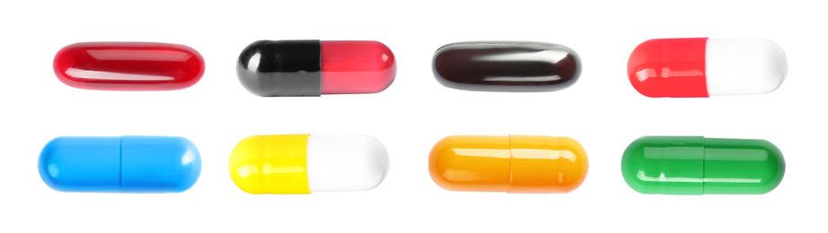 Image of Set with colorful pills on white background, top view. Banner design