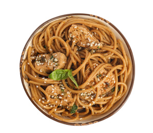 Tasty buckwheat noodles with meat in bowl on white background, top view