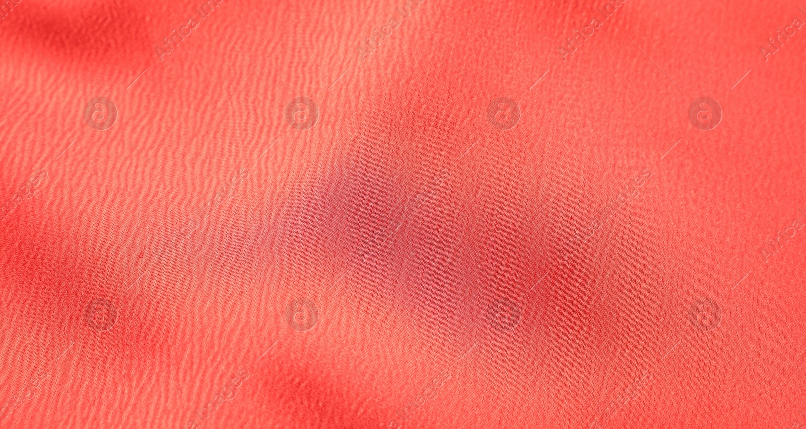 Photo of Texture of red fabric as background, top view