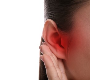 Woman suffering from ear pain on white background, closeup